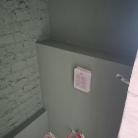 Rekonstrukce bytu Holečkova - tlačítko k wc
