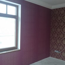 Tapetování vinylovou a textilní tapetou